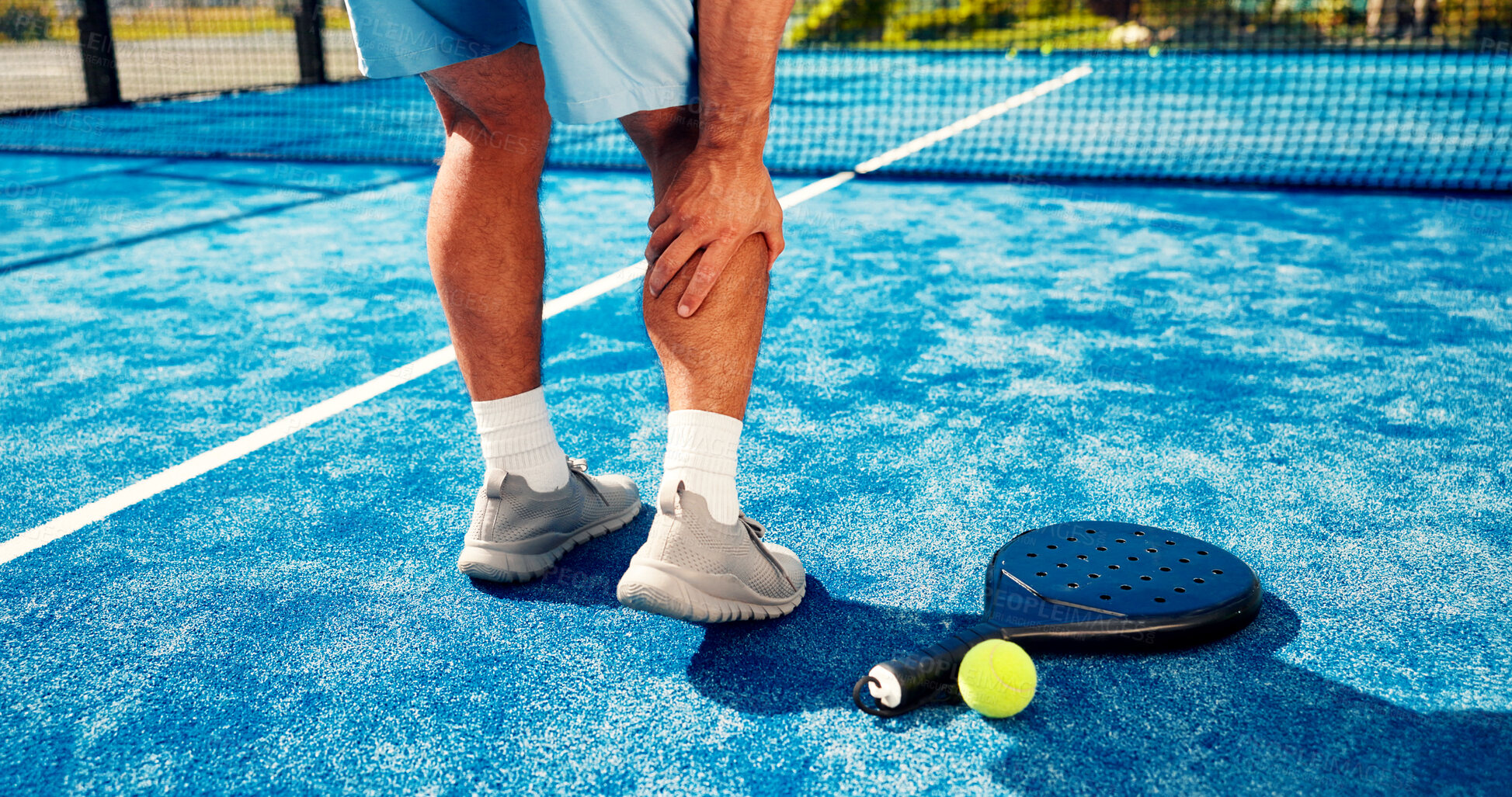 Buy stock photo Hands, person and leg pain on padel court from fitness, match accident and muscle sprain. Player, discomfort and joint strain of exercise mistake, inflammation and sports injury for tennis tournament