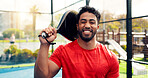Padel, man and happy with portrait on court for competition practice, match training and fitness. Sport athlete, tennis player and smile with racket at health club for tournament exercise and workout