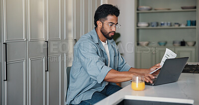 Buy stock photo Home, paperwork and man with laptop, typing and writer with royalty statement, filing or calculation. Creative, author and person with document for self employment tax, online and financial analysis