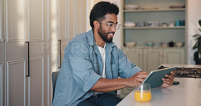 Buy stock photo Remote work, smile and tablet with man in kitchen of home for startup planning or research. App, reading and small business with happy freelance employee at counter in apartment for email feedback
