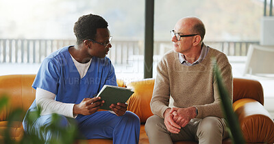 Buy stock photo Tablet, conversation and nurse with mature man on sofa in home for diagnosis, discussion or treatment plan. Technology, consultation and medical caregiver with male patient in house for research.