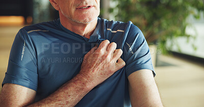 Buy stock photo Hand, chest pain and senior man in home with emergency, hypertension or sickness in living room. Pressure, medical issue and elderly male person in retirement with heart attack symptoms in house