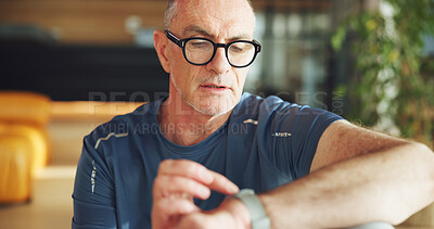 Buy stock photo Fitness, old man and check watch in home to monitor exercise, track performance or results. Retirement wellness, senior person and wristwatch in house for health stats, workout progress or heart rate