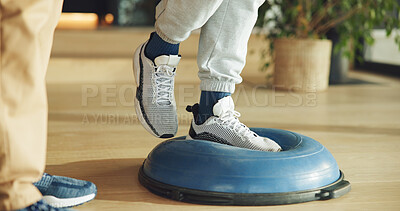 Buy stock photo Feet, person and balance on ball for physiotherapy at house with assistance for mobility training. Physiotherapist, help and patient for stability exercise, muscle strength and rehabilitation session