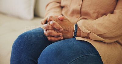Buy stock photo Hands, nervous and thinking with person on sofa in living room of home for anxiety or tension. Depression, psychology or worry with concerned woman in apartment for emotional stress, fear or waiting
