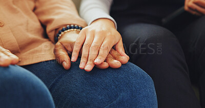 Buy stock photo Holding hands, comfort and nurse with person on sofa in home for healthcare checkup with bad news. Support, consultation and medical caregiver with patient for compassion with empathy in house.