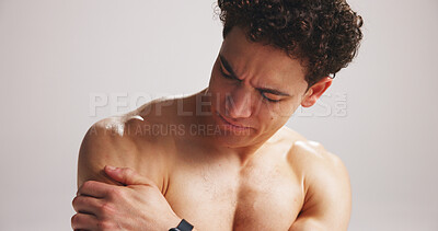 Buy stock photo Fitness, man or shoulder pain in studio from workout challenge, difficult exercise or medical issue. Hurt, person or athlete with joint inflammation, sports injury and discomfort on white background.