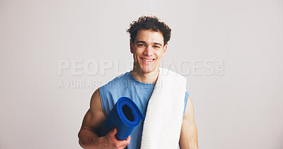 Buy stock photo Happy man, portrait or fitness with yoga mat in studio for health or wellness on a white background. Active, male person or model with smile, towel or ready for physical exercise on mockup space