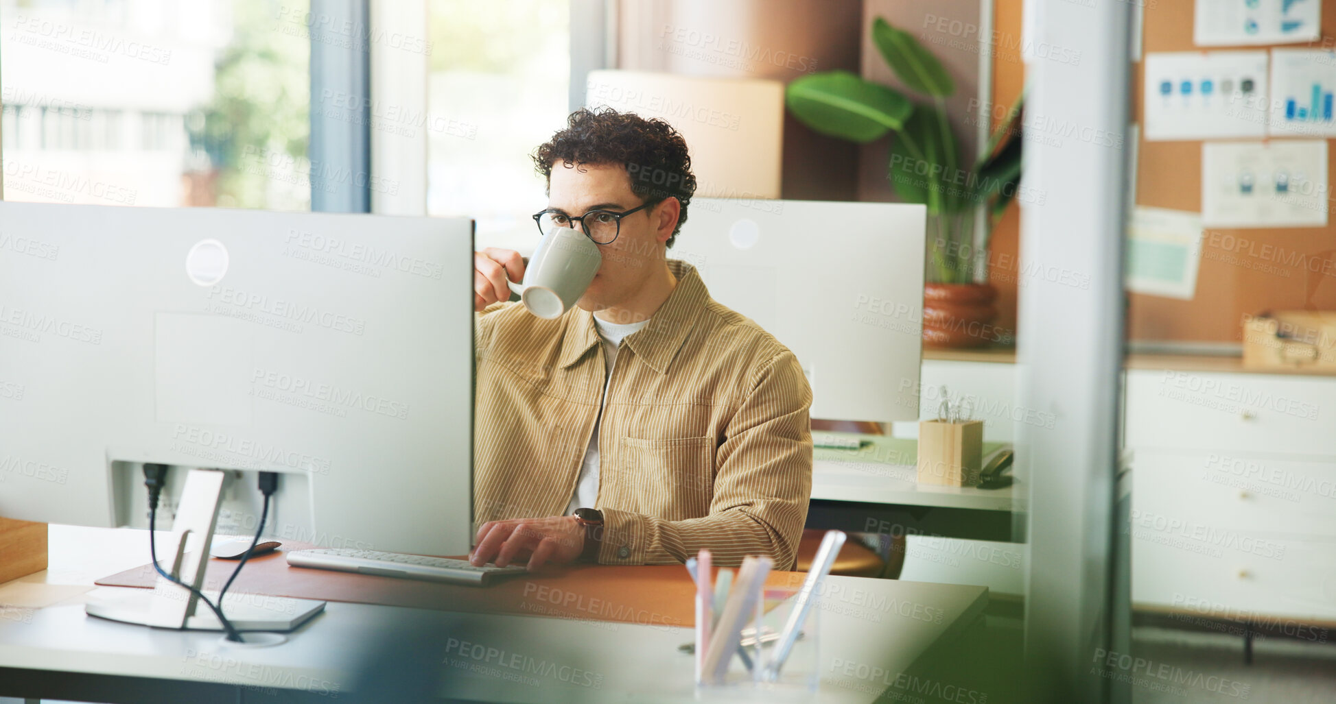 Buy stock photo Business, drinking coffee and man in office, computer and campaign analysis with traffic metrics. Person, employee and creative marketer in workplace, herbal tea and email with caffeine and internet