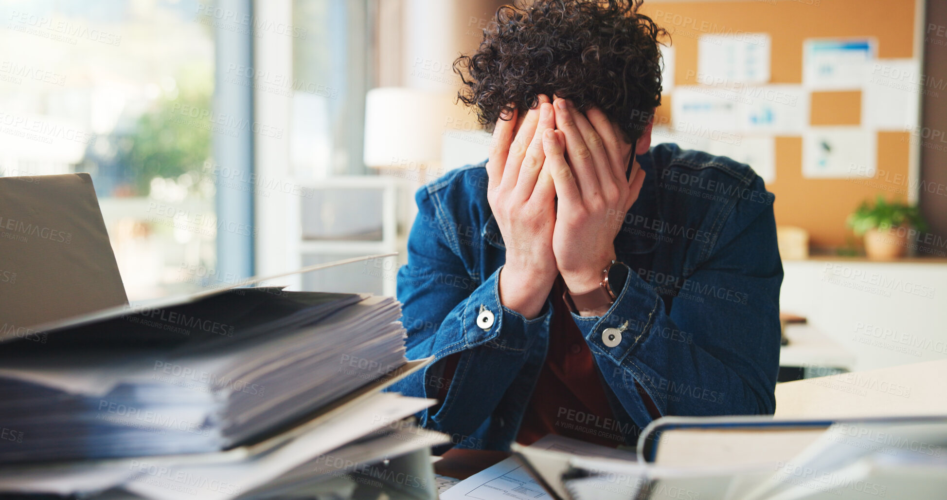 Buy stock photo Overwhelmed, man or burnout in office with workload for marketing proposal, document pile or deadline. Upset, employee and creative person with stress for paperwork, pressure or information overload.