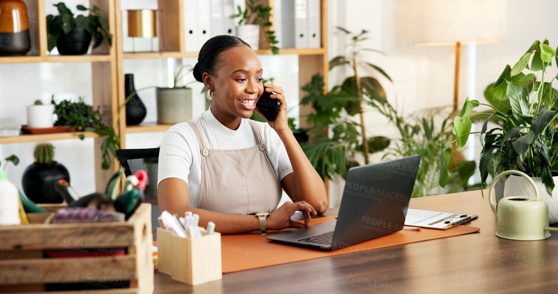 Buy stock photo Phone call, smile or black woman in office with laptop, client chat or research on sustainable material. Happy, review or eco consultant in agency with tech, feedback or negotiation on green product.