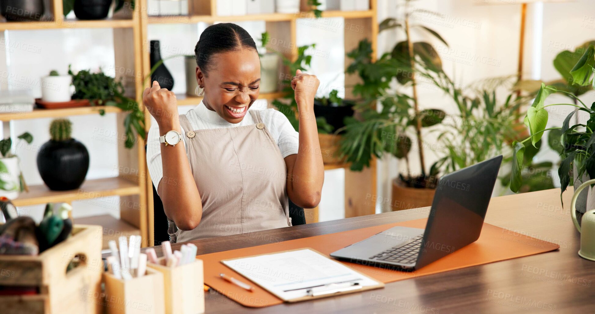 Buy stock photo Excited, florist and woman with laptop, office and fist pump for good news on website or celebration. Plant shop, entrepreneur and black person with hand gesture for success, ecommerce and sales