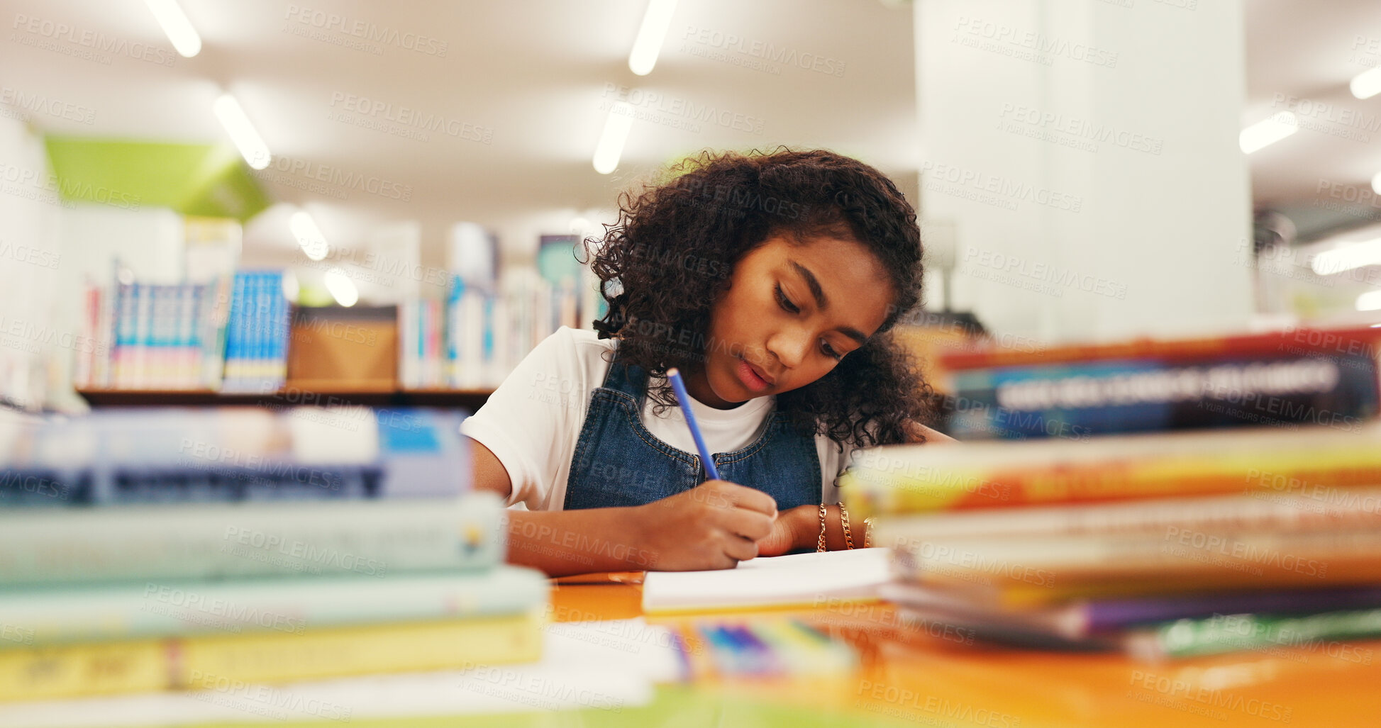 Buy stock photo Writing, homework and girl in library, kid and education with knowledge, learning and growth. Student, notebook and child development with assessment, creativity and inspiration for project and ideas