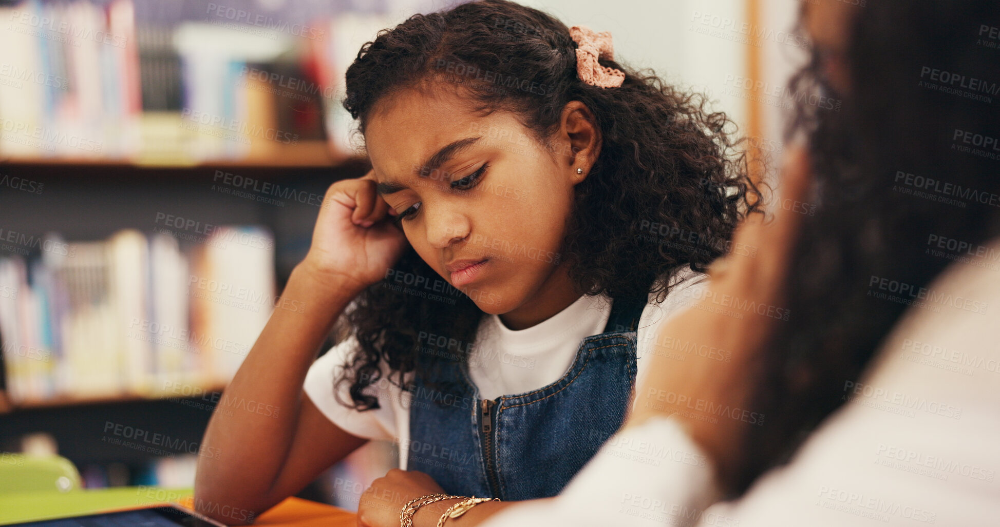 Buy stock photo Tutor, confused or child in library with homework, teaching or frustration in learning struggle. Education, difficult or mentor at table with reading, worry or sld support for academic development.