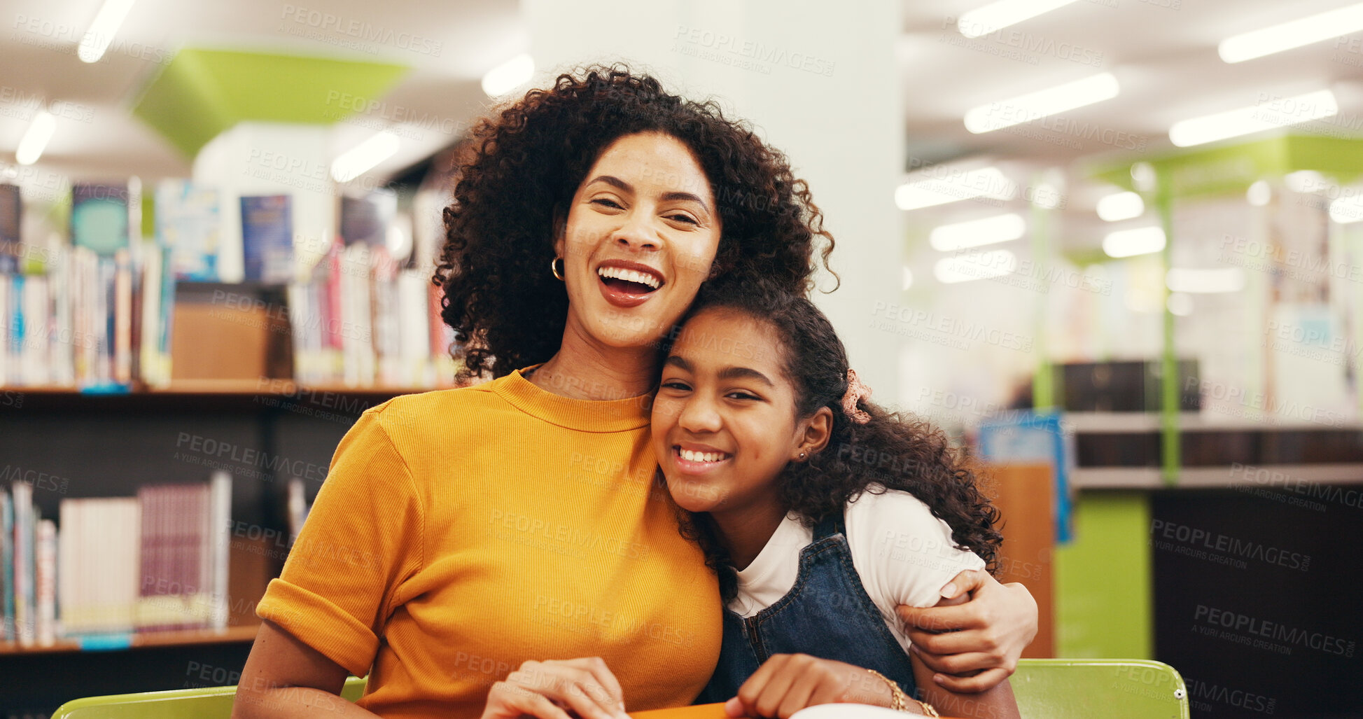 Buy stock photo Portrait, mother and child in library with hug, teaching or comfort in literature hobby. Happiness, education and family at table with embrace, reading support and guidance for academic development.