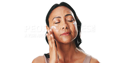 Buy stock photo Mature woman, skincare and cream in studio for face, benefits and mockup space on white background. Person, beauty and dermatology with natural glow, application and anti aging lotion for hydration
