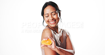 Buy stock photo Squeeze, skincare and woman with orange in studio for natural, organic or facial cosmetics. Happy, vitamin c and mature female person with citrus fruit for antiaging dermatology by white background.