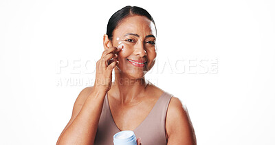Buy stock photo Face cream, happy and portrait of woman in studio with natural, moisturizing or facial routine. Health, skincare and mature female person with dermatology spf, sunscreen or lotion by white background