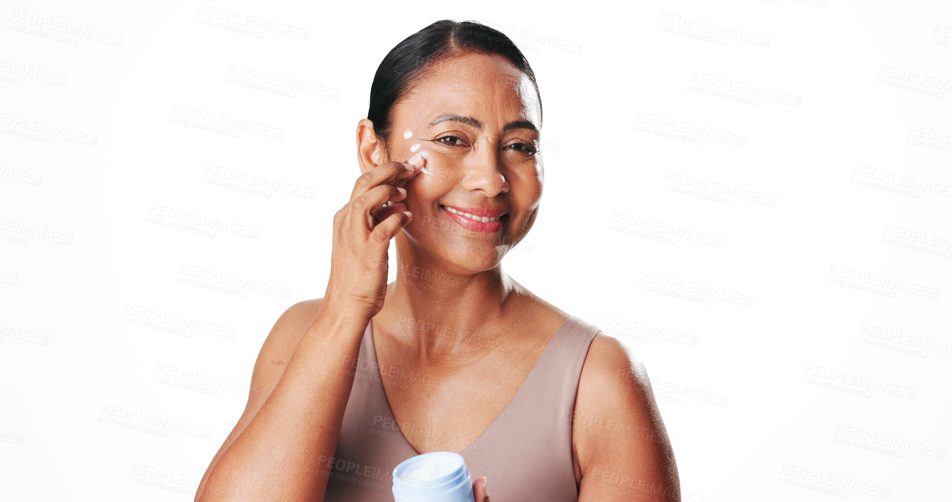 Buy stock photo Face cream, happy and portrait of woman in studio with natural, moisturizing or facial routine. Health, skincare and mature female person with dermatology spf, sunscreen or lotion by white background