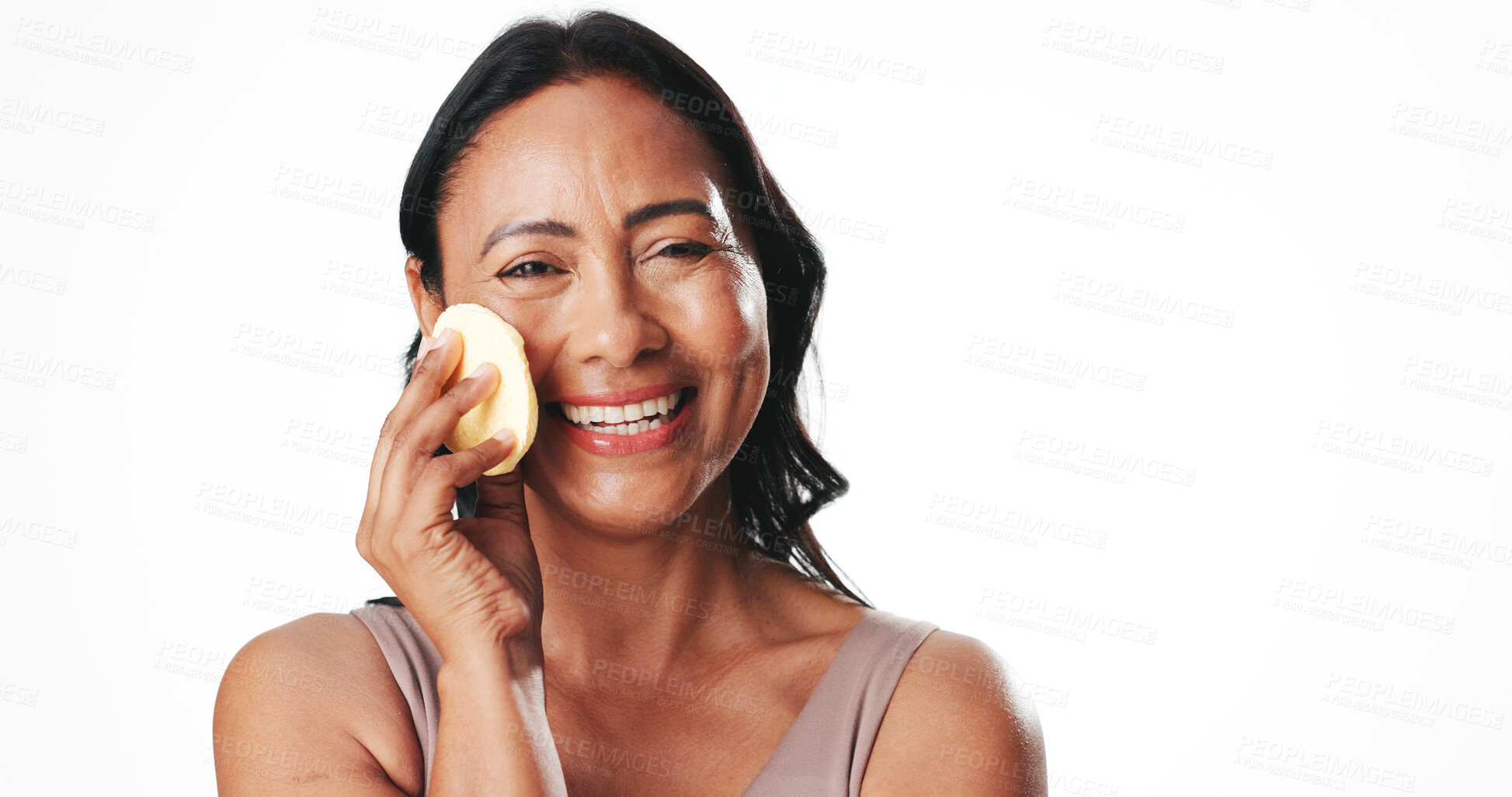 Buy stock photo Portrait, skincare and woman with cotton pad, studio and laugh with makeup remover and mockup space. White background, beauty or mature person with sponge for self care, cleanse or grooming in Mexico