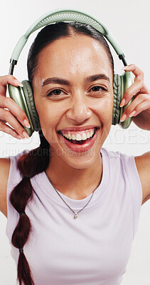 Buy stock photo Headphones, fitness and portrait with woman in studio for streaming service, workout playlist and health. Radio subscription, exercise podcast and music with person on white background for audio