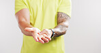 Hands, fitness and wrist pain with injury in studio, inflammation or mockup space on white background. Person, joint ache and massage for muscle fatigue, arthritis or carpal tunnel with training