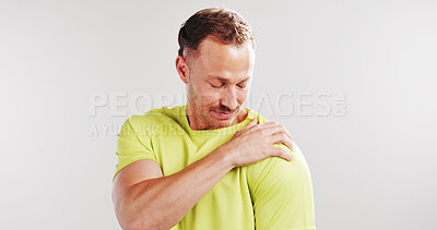 Buy stock photo Fitness, shoulder pain and injury with man in studio for workout accident, inflammation or fibromyalgia. Exercise mistake, training burnout and sprain with person on white background for tension
