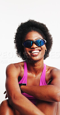 Buy stock photo Athlete, fashion and woman with sunglasses, laugh or UV protection with goggles for glare reduction. White background, studio and black person with blue tint eyewear and visual shield for eye care
