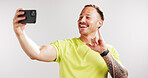 Selfie, shaka sign and fitness with man in studio for social media gym membership promotion and hand gesture. Profile picture, personal trainer post and photography with person on white background