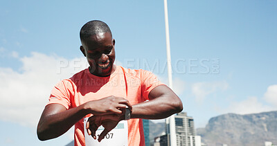Buy stock photo Runner, smart watch and smile with black man in city for marathon, long distance stats and tracking progress. Health, speed performance and training app with person outdoor for cardio and timer 