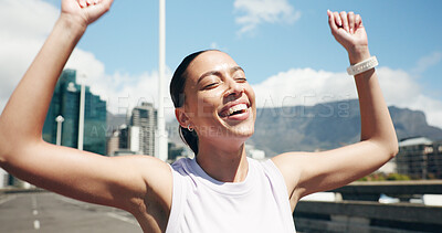 Buy stock photo Happy woman, runner and winning with marathon success in city for fitness challenge or competition. Active, female person or winner with smile or fist pump for sport race, sprint or victory in town