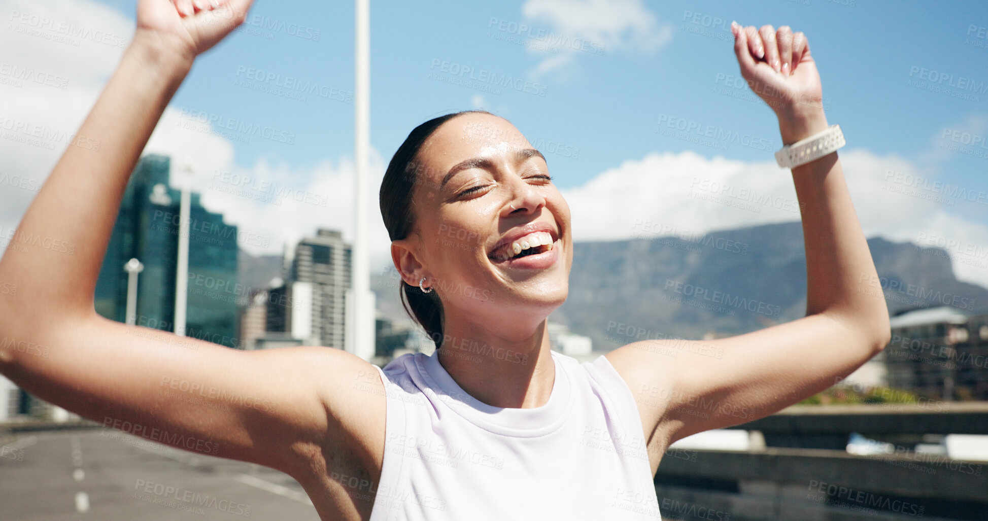 Buy stock photo Happy woman, runner and winning with marathon success in city for fitness challenge or competition. Active, female person or winner with smile or fist pump for sport race, sprint or victory in town