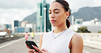 Woman, runner and phone with fitness in city, bridge and break with notification, texting and training. Person, smartphone and scroll on mobile app with search for exercise tips in town with routine