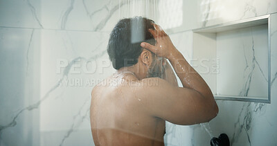 Buy stock photo Water, hygiene and man in shower in bathroom for germs, dirt or bacteria removal with body care. Grooming, dermatology and male person washing skin for health, wellness or morning routine in home.