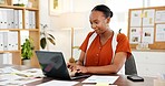 Accounting, laptop and typing with business black woman in office to review sales report statistics. Computer, data and documents with African employee at desk in workplace for management or planning