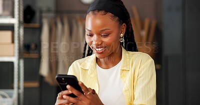 Buy stock photo Phone, small business or black woman in office for shipping, fashion supply chain or online reviews. Logistics, mobile or happy worker with distribution update, typing or reading email for ecommerce