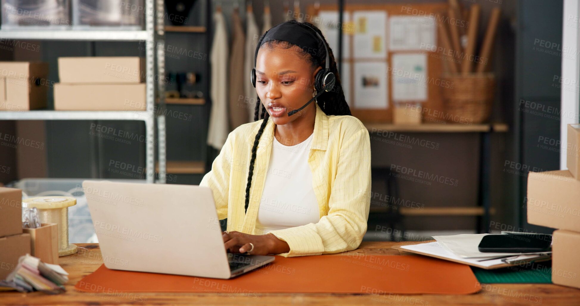 Buy stock photo Headset, laptop and supply chain with black woman in office for delivery, distribution or shipping support. Communication, help or parcel tracking with employee at work for assistance or website info