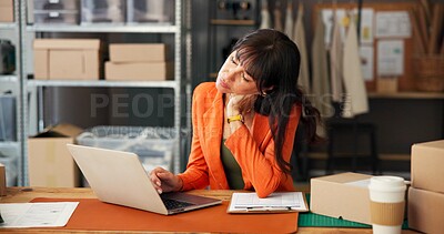 Buy stock photo Woman, neck pain and logistics with laptop at startup, stress and massage for inflammation at warehouse. Mature person, shipping and pc with injury, frustrated or burnout with inventory management