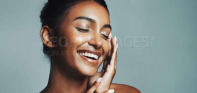 Buy stock photo Smile, woman and laughing for skincare in studio with beauty, healthy skin and natural shine. Space, female person and cosmetics for facial glow, collagen treatment and dermatology on gray background