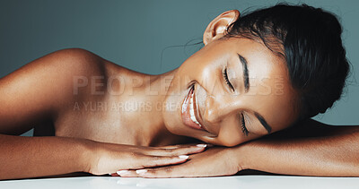 Buy stock photo Beauty, relax and smile of Indian woman in studio for cosmetics or dermatology satisfaction. Aesthetic, skincare and wellness with happy model by background for cosmetology benefits or results