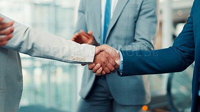 Buy stock photo Business people, meeting and team with handshake for deal, agreement or partnership in office. Group, employees or colleagues shaking hands for b2b introduction, onboarding or welcome in workplace