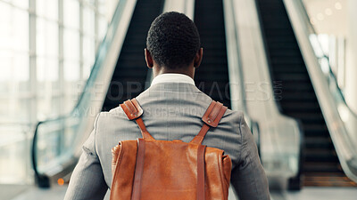 Buy stock photo Businessman, escalator and airport for travel with backpack, luggage and walk for global departure. Person, business trip and baggage at stairs, immigration or international flight at terminal