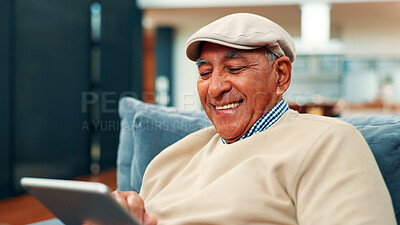 Buy stock photo Tablet, smile and senior man on sofa in home with connection, social media or blog post. Retirement, digital technology and elderly person in living room for reading news headline on app in house.