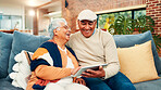 Home, happy and senior couple on tablet for online streaming, subscription and bonding. Retirement, marriage and mature man and woman on digital tech for videos, watching movie and relax on sofa