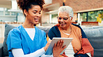 Talking, tablet and nurse with old woman in home for discussion, consulting and diagnosis. Retirement, healthcare and caregiver with senior person on tech for online results, medical exam or wellness