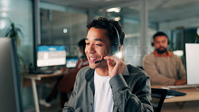 Buy stock photo Man, mic and call center with conversation at night, communication or contact us for online query. Help desk, support and telecom at computer, agent and headset with consulting at coworking office