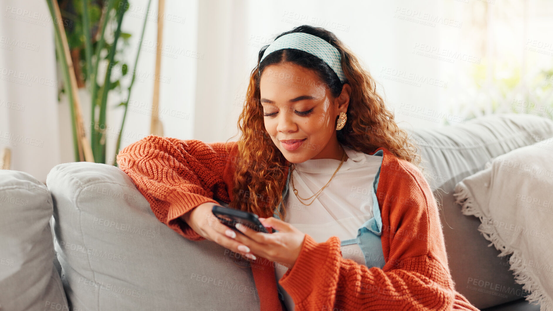 Buy stock photo Woman, relax and texting with smartphone, lounge and communication with contact on social media app. Typing, message and person with mobile for chat, online and browsing on website, break and home