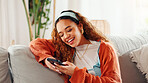 Woman, laugh and texting with smartphone, lounge and communication with contact on social media app. Typing, message and person with mobile for chat, online and browsing on website, break and home