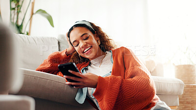 Buy stock photo Woman, relax and laugh with phone at house for social media, reading meme and funny video. Smile, female person and mobile app for browsing website, streaming comedy and online joke for entertainment
