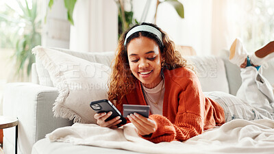 Buy stock photo Credit card, phone and relax with woman on sofa for online shopping, ecommerce and sale. Digital payment, banking website and person in living room of home for deal, transaction or subscription